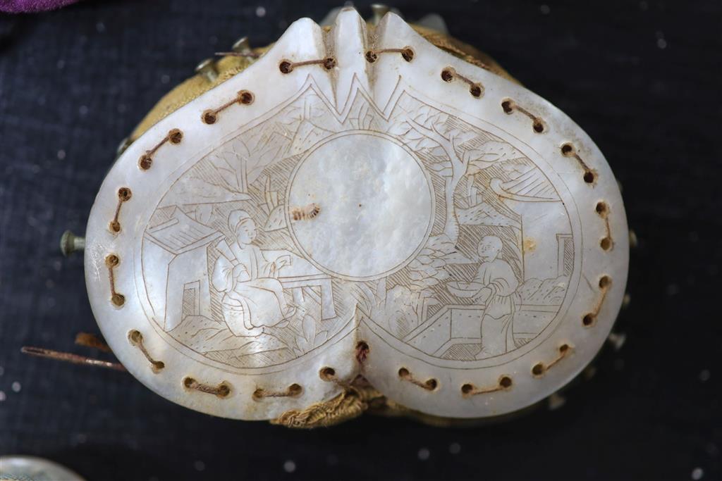 Eight assorted 19th century mother of pearl mounted pin cushions